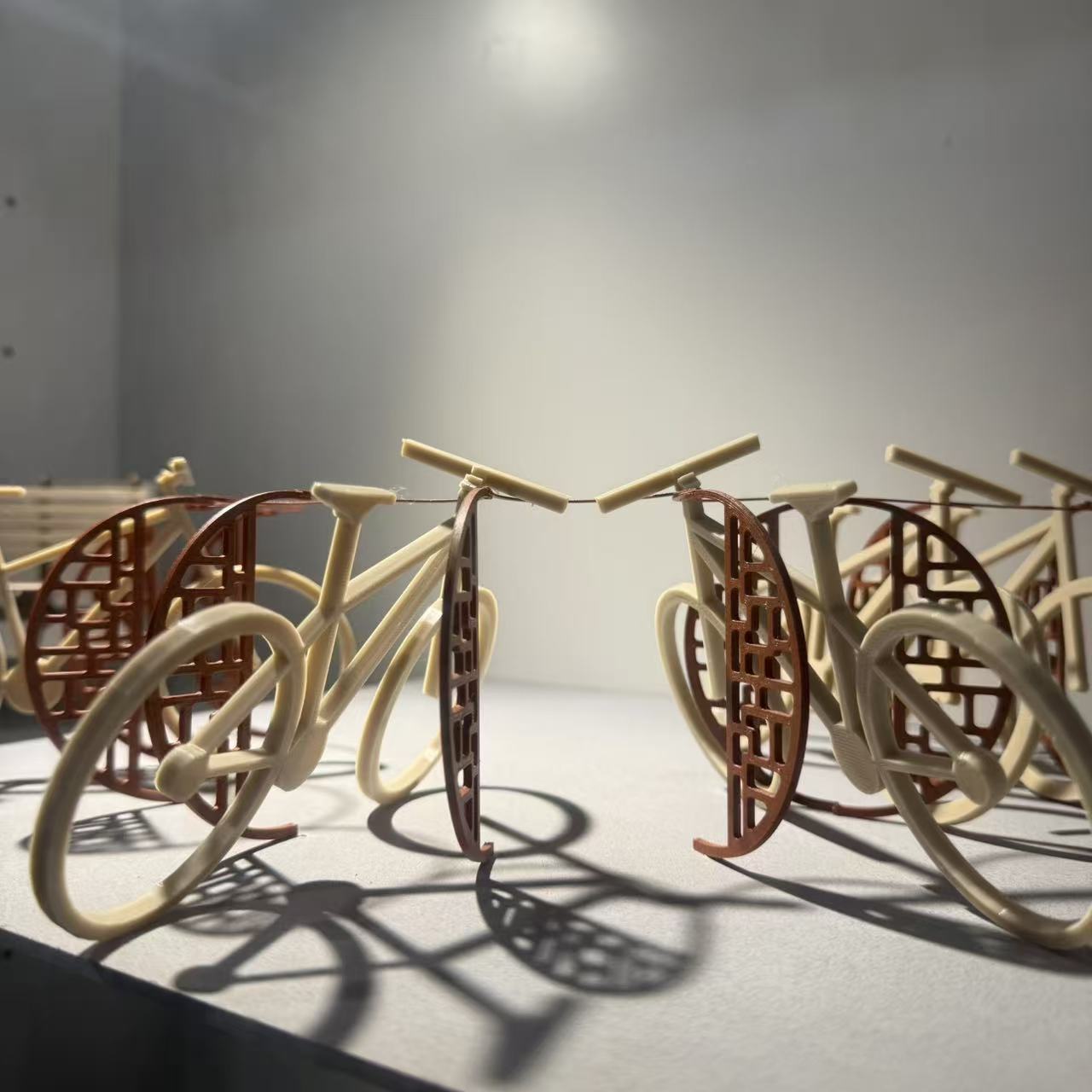 The material is plastic because it's made by 3D printing The program associated with using them is Honours Bachelor of Craft and Design 